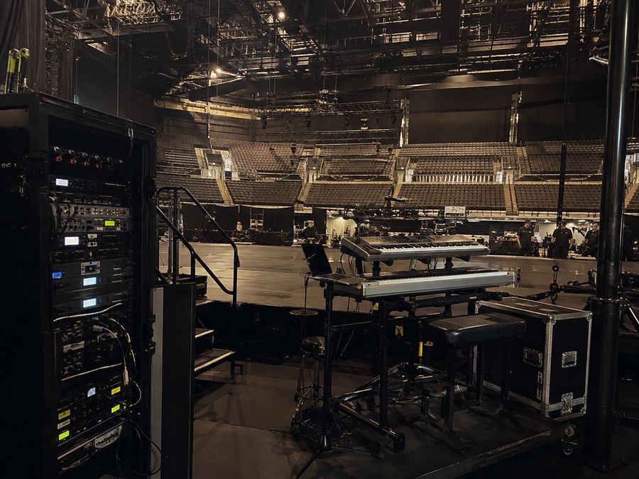 Keyboard rig and rack gear on an arena stage before a show